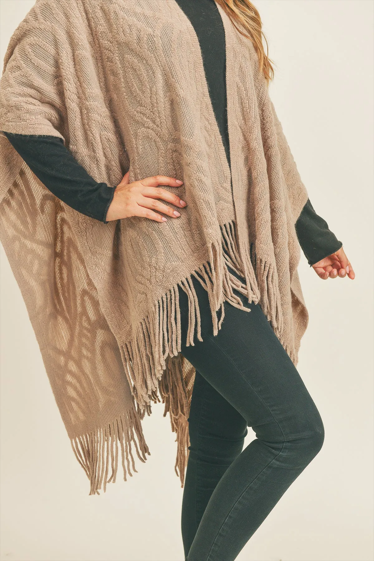 EMBOSSED PATTERN TASSEL RUANA