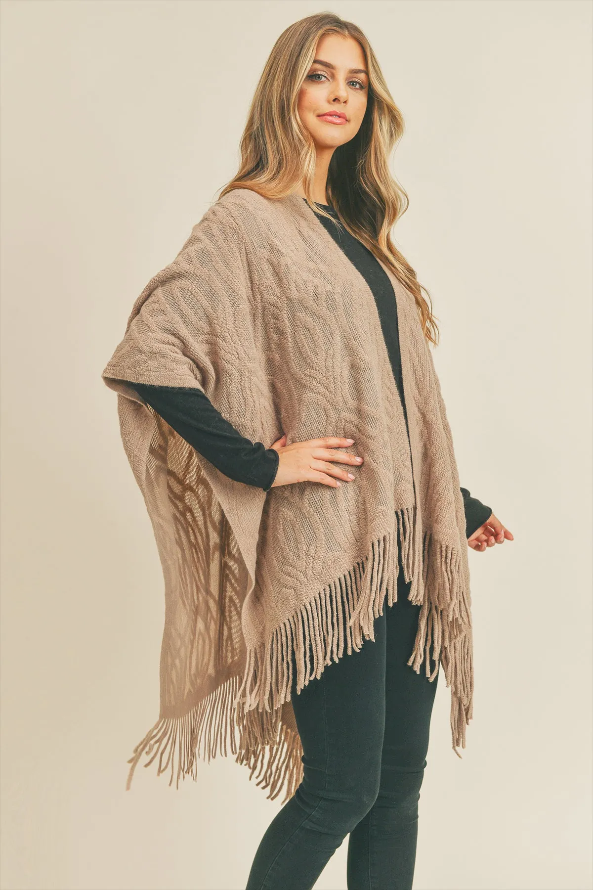 EMBOSSED PATTERN TASSEL RUANA