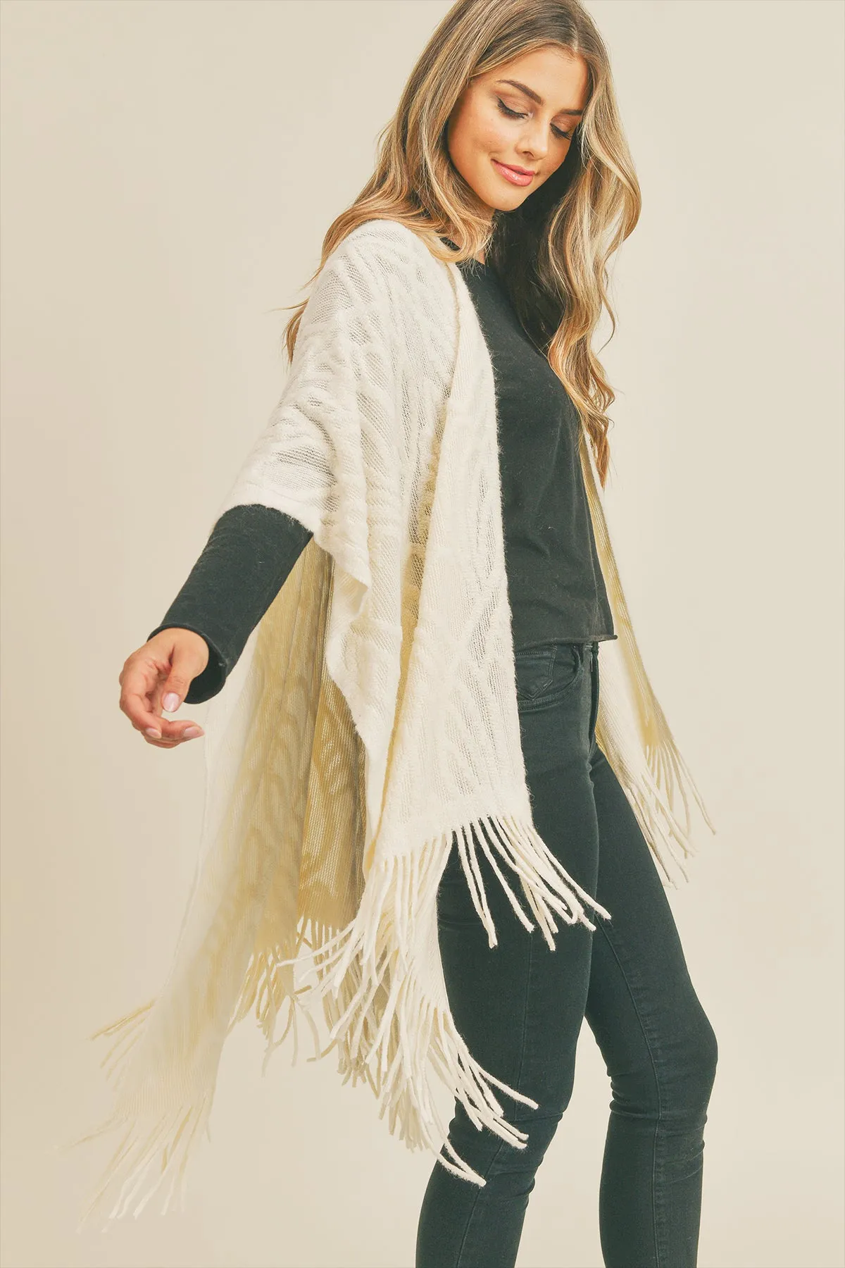 EMBOSSED PATTERN TASSEL RUANA