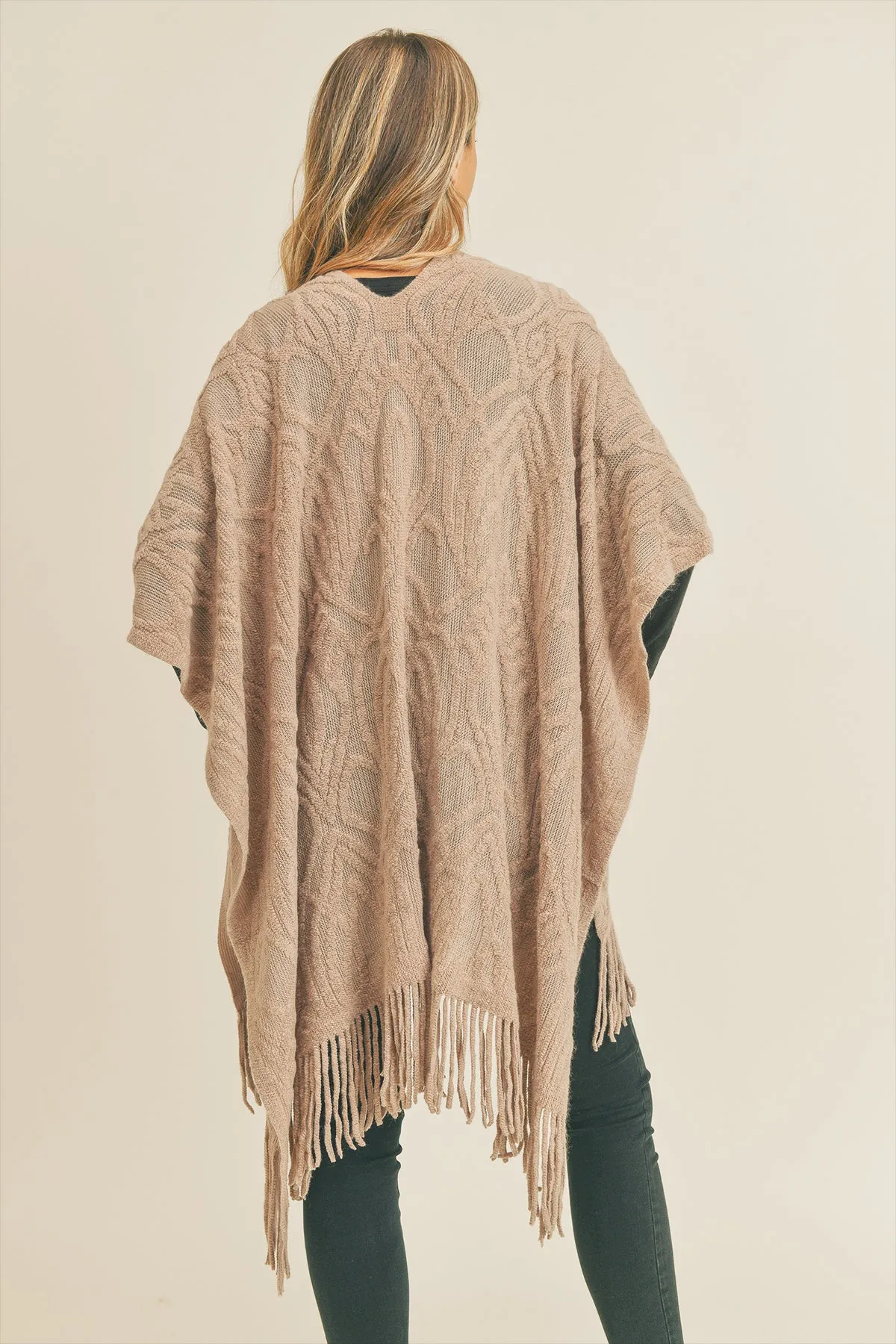 EMBOSSED PATTERN TASSEL RUANA