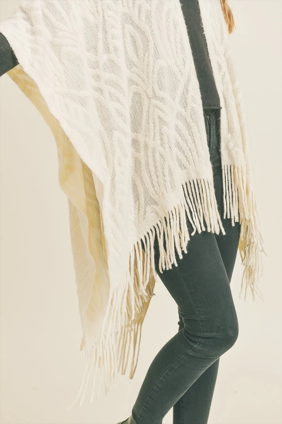 EMBOSSED PATTERN TASSEL RUANA