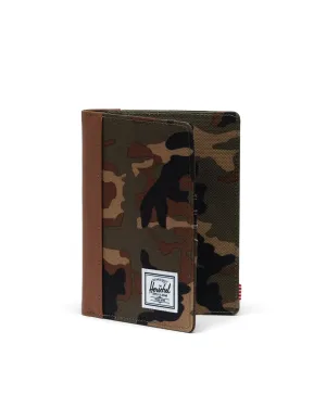 RAYNOR PASSPORT HOLDER (CAMO) - HERSCHEL