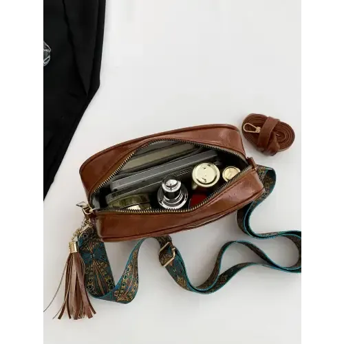 Stylish Brown Leather Crossbody Bag with Trendy Printed Strap Cassette