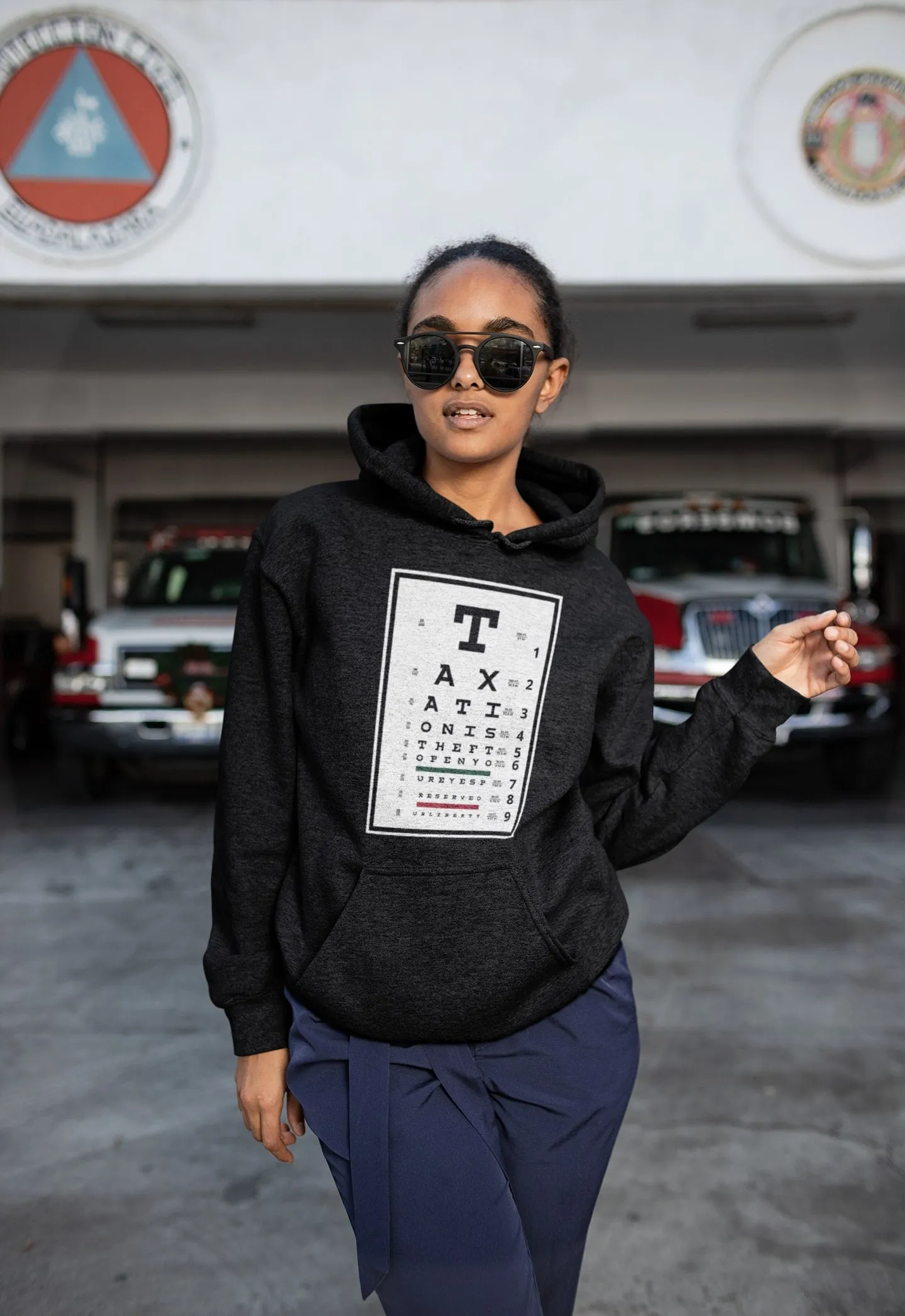 Taxation is Theft Eye Chart Light Hoodie